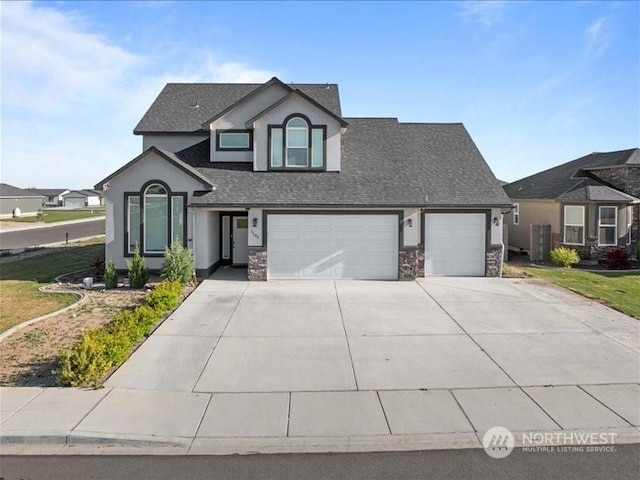 view of front of home featuring a garage