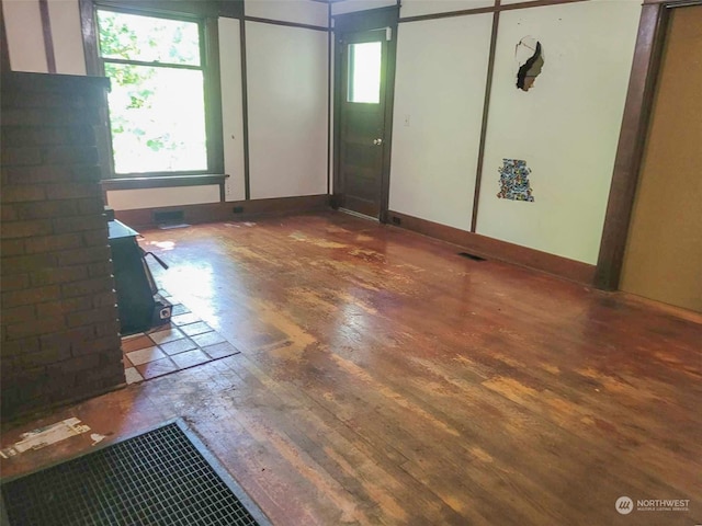 empty room featuring dark hardwood / wood-style flooring