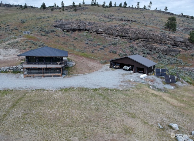 birds eye view of property featuring a rural view