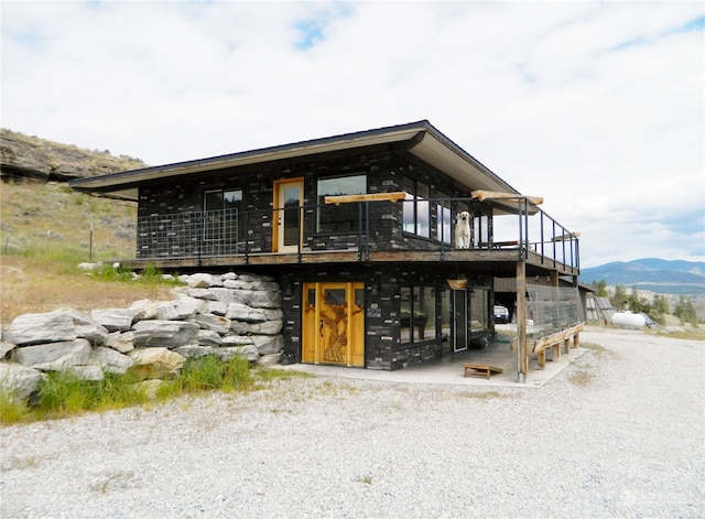 exterior space featuring a mountain view