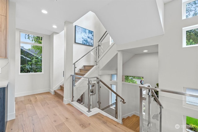 staircase featuring hardwood / wood-style flooring