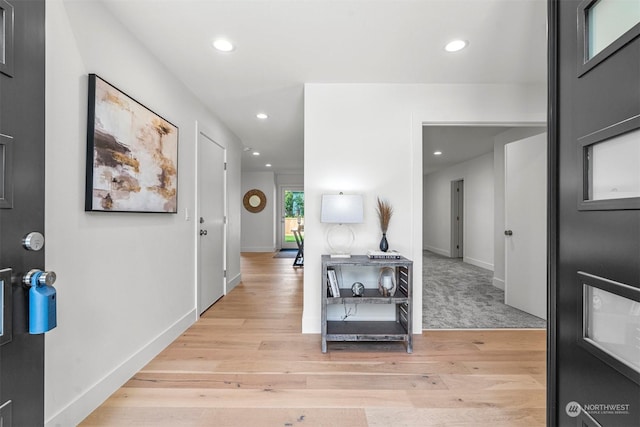 corridor featuring light hardwood / wood-style flooring