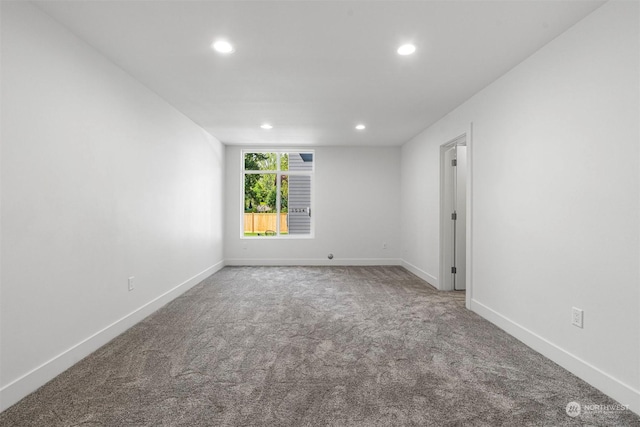 empty room with carpet flooring