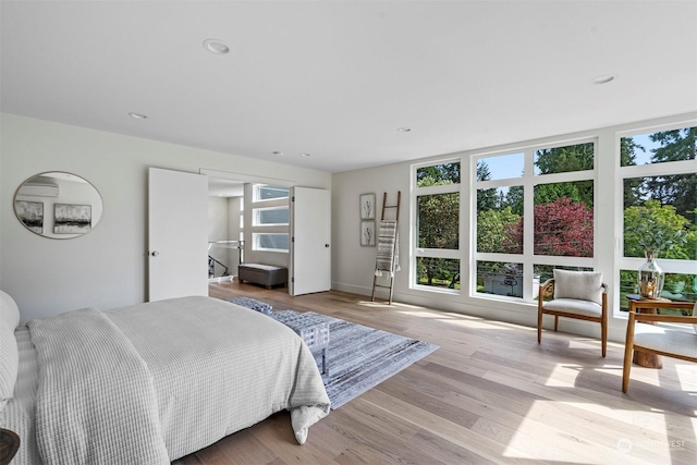 bedroom with light hardwood / wood-style floors