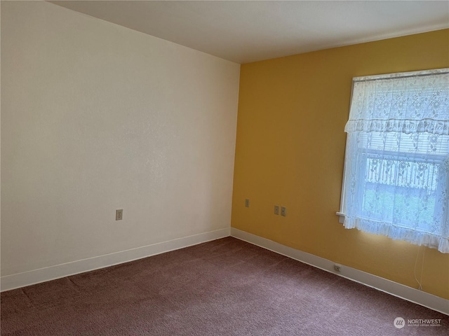 unfurnished room with carpet