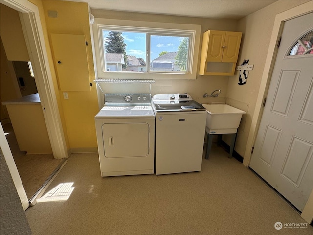 laundry room with separate washer and dryer