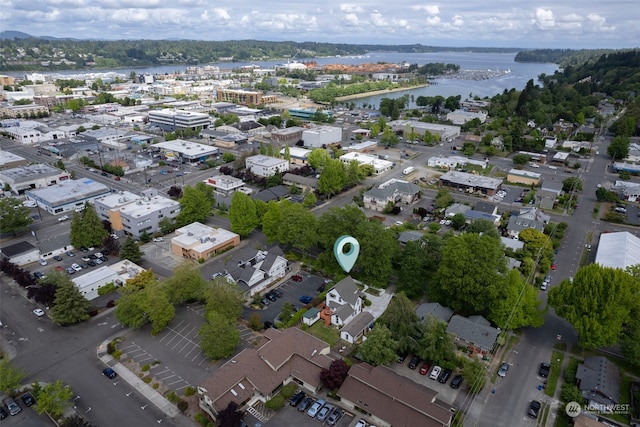 birds eye view of property featuring a water view