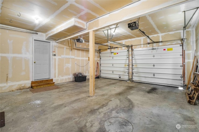 garage featuring a garage door opener