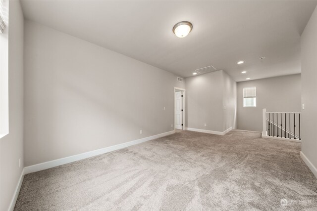 empty room with carpet flooring