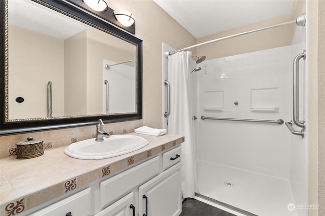 bathroom with vanity and curtained shower