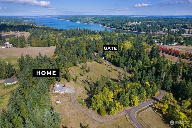 birds eye view of property featuring a water view