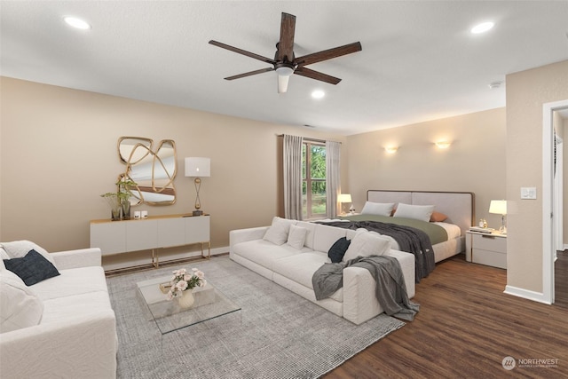 bedroom featuring hardwood / wood-style flooring and ceiling fan