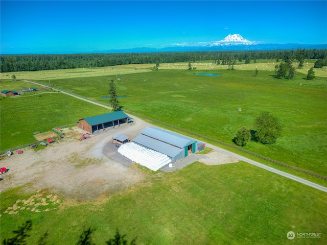 birds eye view of property featuring a rural view