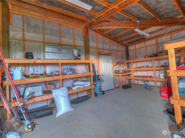 garage with a workshop area