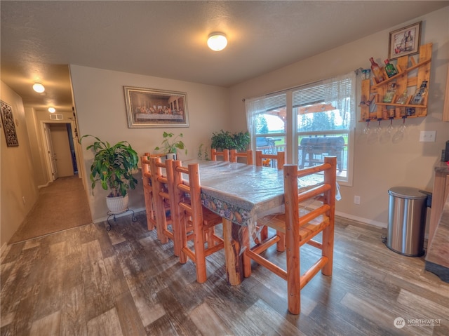 dining room featuring hardwood / wood-style flooring