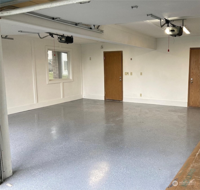 8167 Possession Ridge Ln, Clinton, WA 98236 - garage featuring a garage door opener