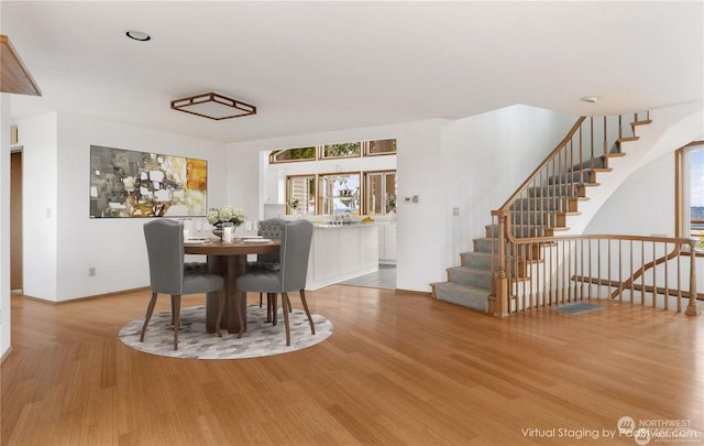 8167 Possession Ridge Ln, Clinton, WA 98236 - dining room featuring light hardwood / wood-style flooring