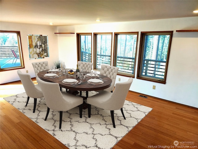 8167 Possession Ridge Ln, Clinton, WA 98236 - dining room featuring light wood-type flooring