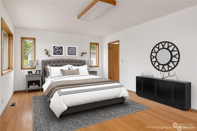 8167 Possession Ridge Ln, Clinton, WA 98236 - bedroom featuring hardwood / wood-style floors