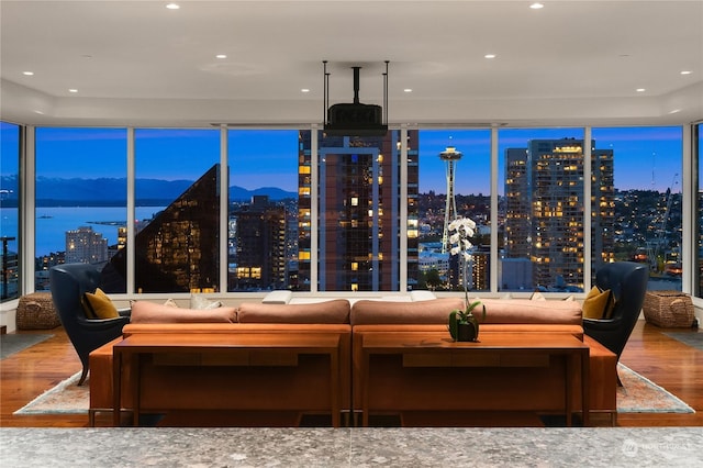 interior space featuring hardwood / wood-style floors and a water view