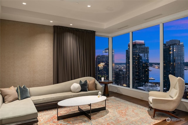 interior space featuring hardwood / wood-style floors and a water view