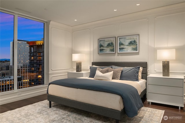 bedroom featuring dark wood-type flooring