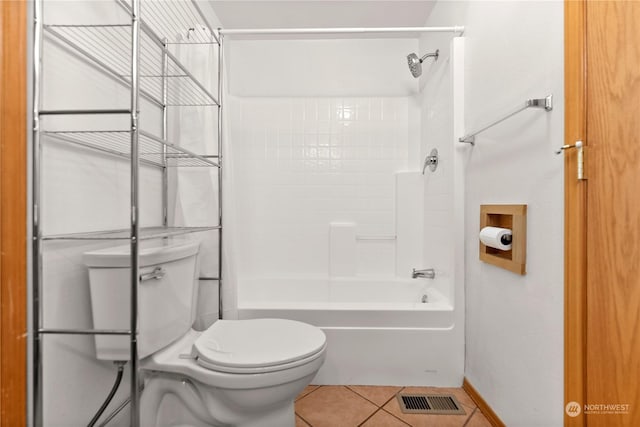 bathroom with tile patterned flooring and toilet