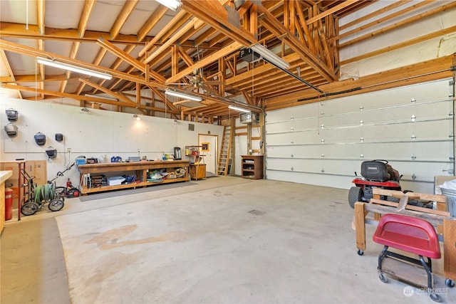 garage featuring a workshop area