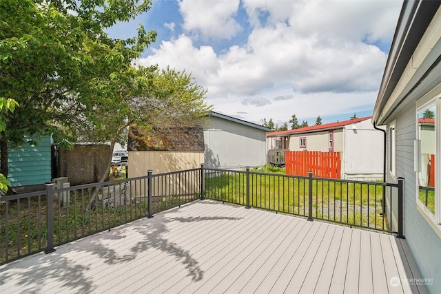 deck featuring a yard