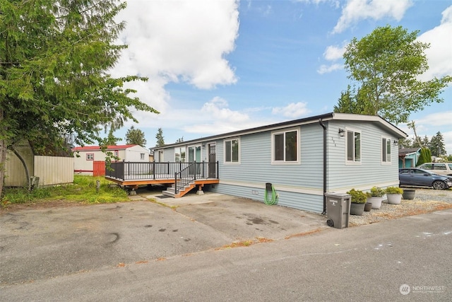 manufactured / mobile home featuring a deck