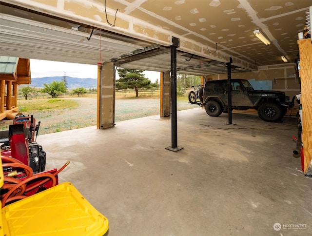 garage featuring a mountain view