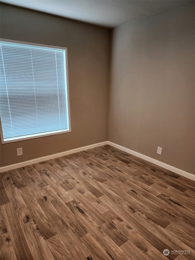 empty room featuring hardwood / wood-style floors