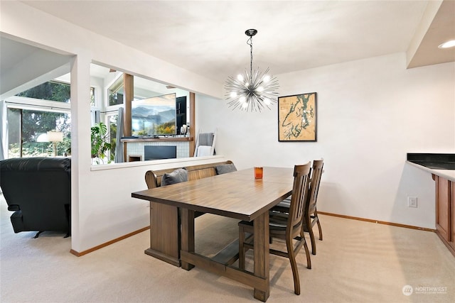 carpeted dining space with an inviting chandelier