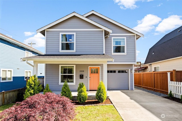 view of front of home with a garage and a porch