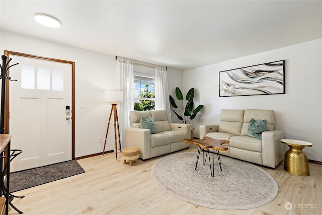 living room with light hardwood / wood-style flooring