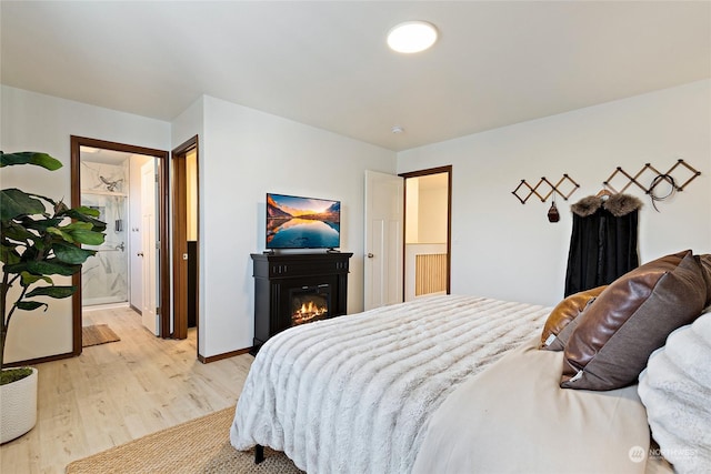 bedroom featuring light hardwood / wood-style flooring