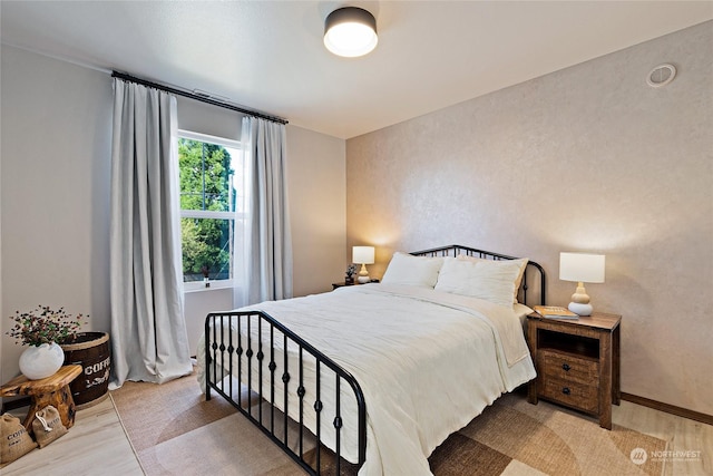 bedroom featuring light hardwood / wood-style flooring