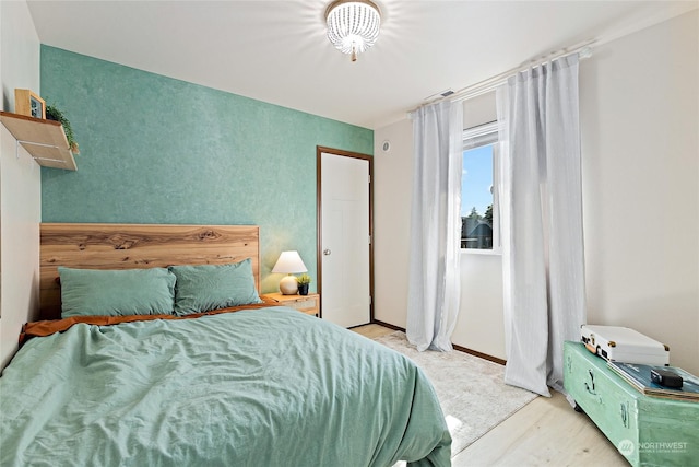 bedroom featuring light hardwood / wood-style floors