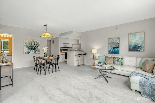 living room with light colored carpet