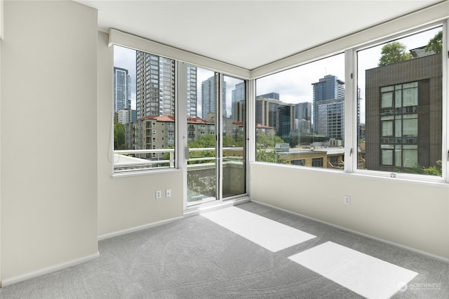 unfurnished sunroom featuring plenty of natural light