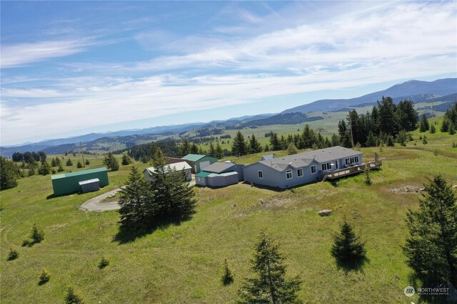 bird's eye view with a mountain view and a rural view