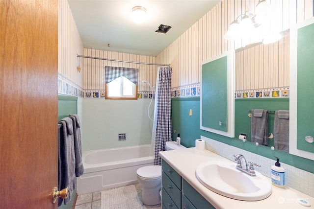 full bathroom with shower / tub combo, tile patterned floors, toilet, and vanity