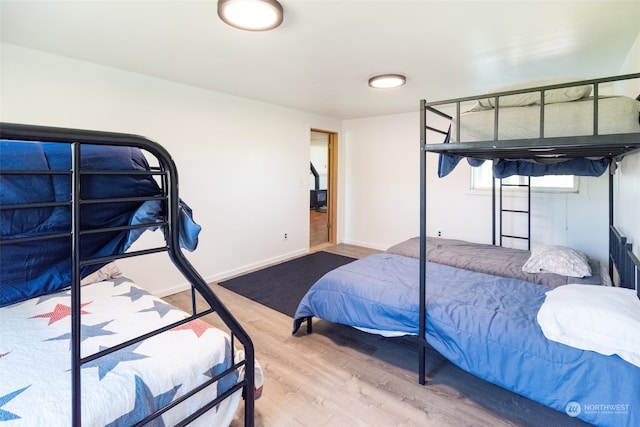 bedroom featuring wood-type flooring