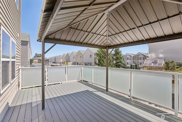 wooden terrace with a gazebo