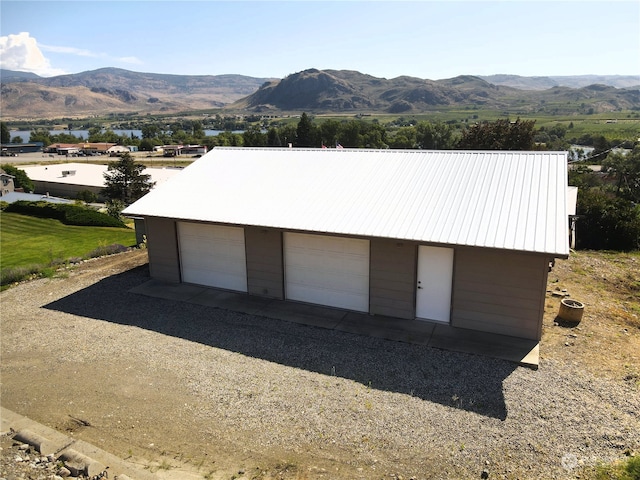 garage featuring a mountain view