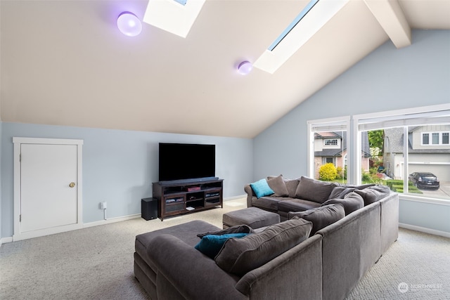 living room featuring lofted ceiling with skylight and light colored carpet