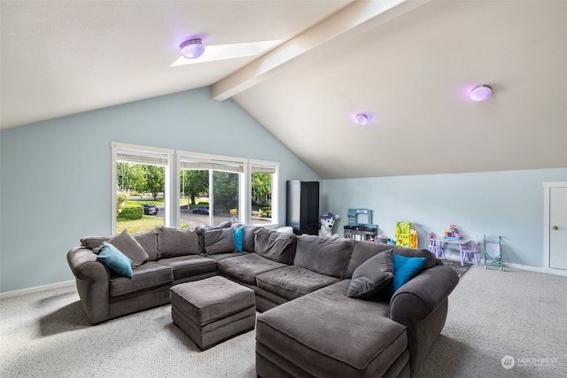 living room with lofted ceiling with skylight and carpet