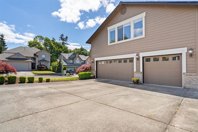 view of side of property featuring a garage