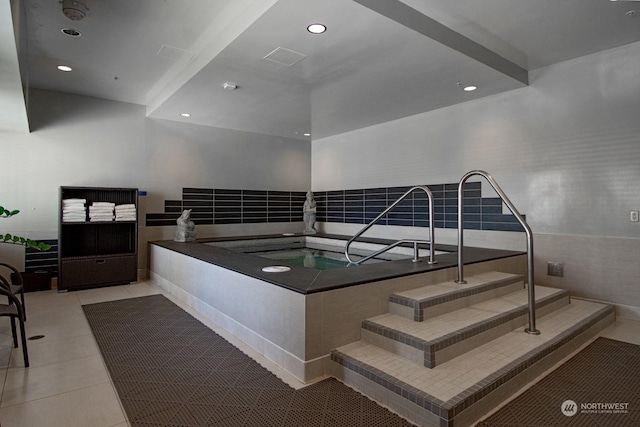 bathroom with tile patterned flooring