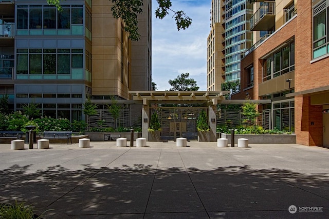 view of property's community featuring a pergola